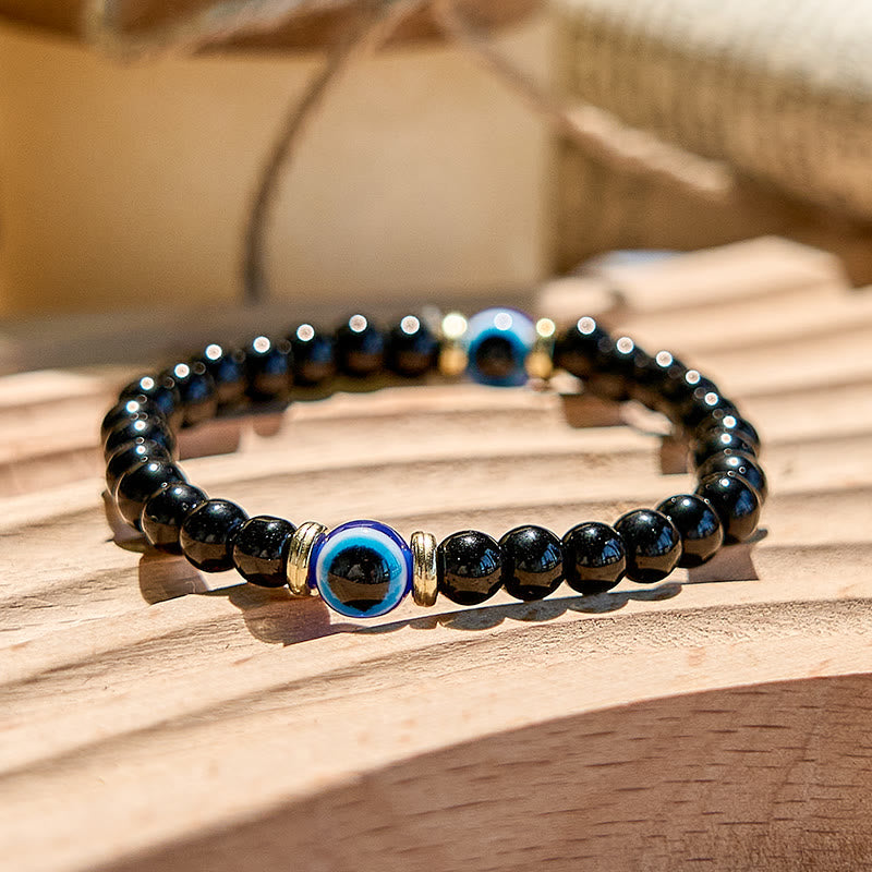 Bracelet de perles contre le mauvais œil en onyx noir naturel Olivenorma