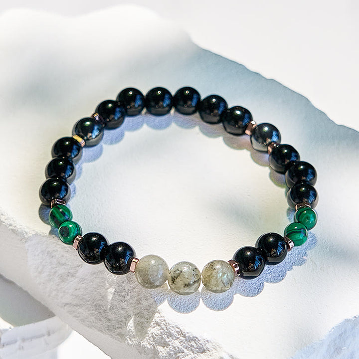 Bracelet de perles en onyx noir, hématite, labradorite et malachite Olivenorma