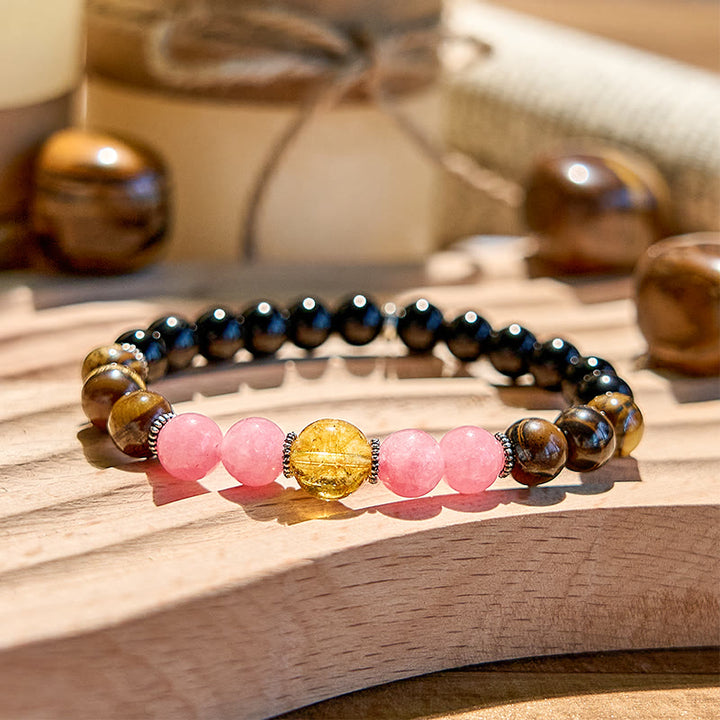 Bracelet de perles en obsidienne, œil de tigre et rhodonite Olivenorma