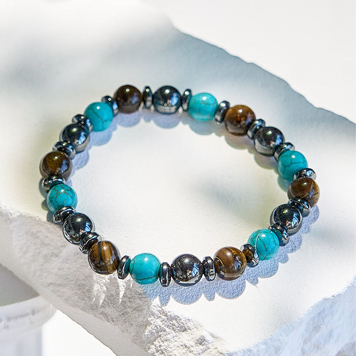 Bracelet de perles en hématite et œil de tigre turquoise Olivenorma