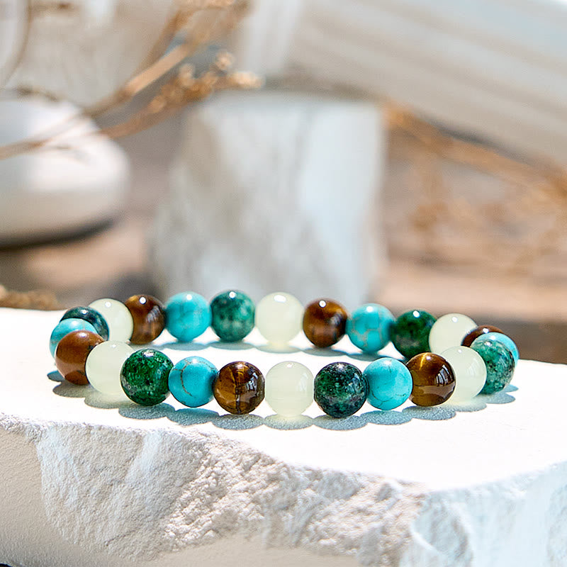 Bracelet de perles en œil de tigre et péridot turquoise africaine Olivenorma