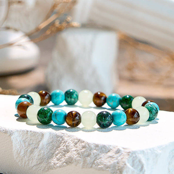 Bracelet de perles en œil de tigre et péridot turquoise africaine Olivenorma