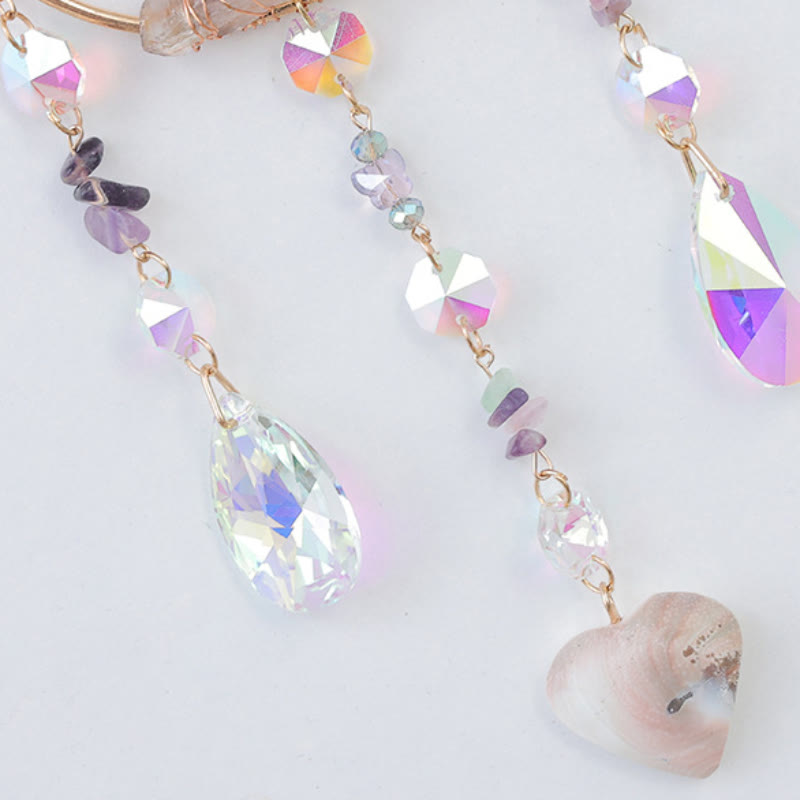 Carillon éolien Olivenorma en quatre pierres naturelles représentant l'arbre de vie