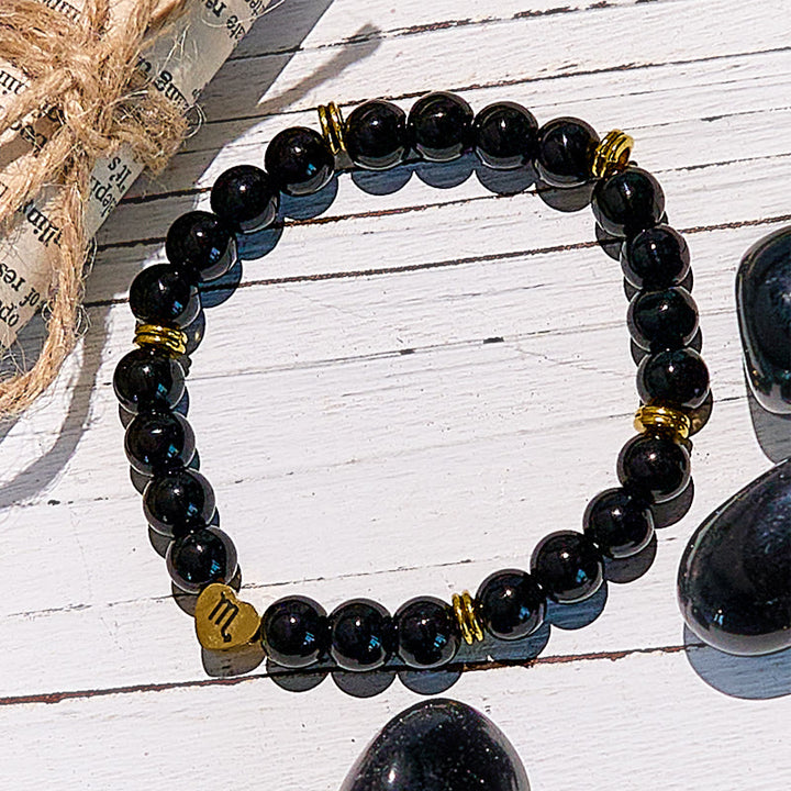 Bracelet de perles en obsidienne naturelle avec signe du zodiaque Olivenorma