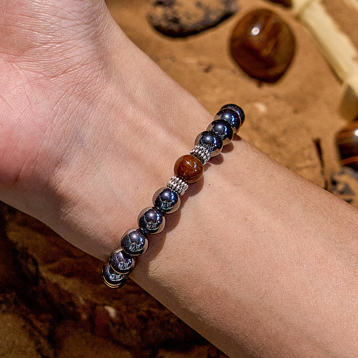 Bracelet de perles noires en œil de tigre naturel Olivenorma