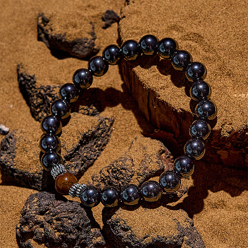Bracelet de perles noires en œil de tigre naturel Olivenorma