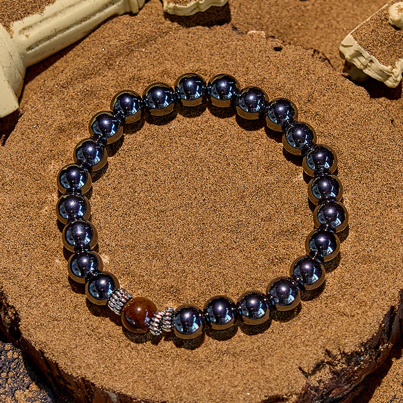 Bracelet de perles noires en œil de tigre naturel Olivenorma