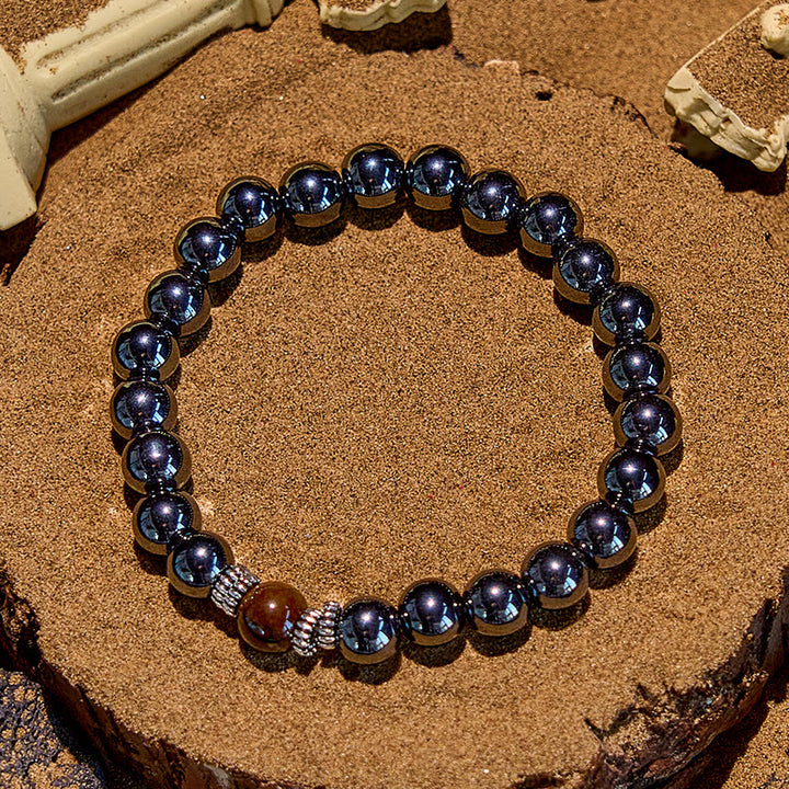 Bracelet de perles noires en œil de tigre naturel Olivenorma