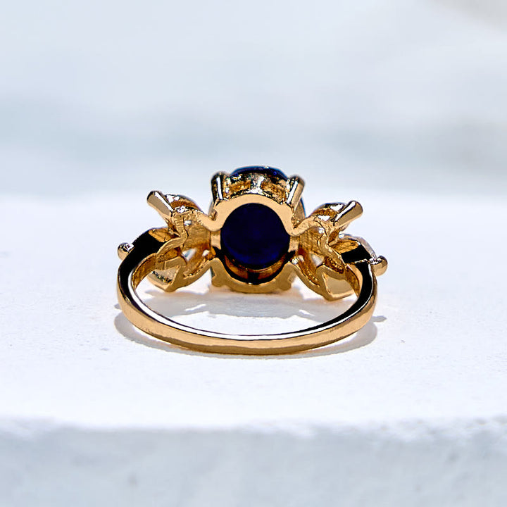 Bague en forme de feuille en grès bleu et zircon taille ovale Olivenorma