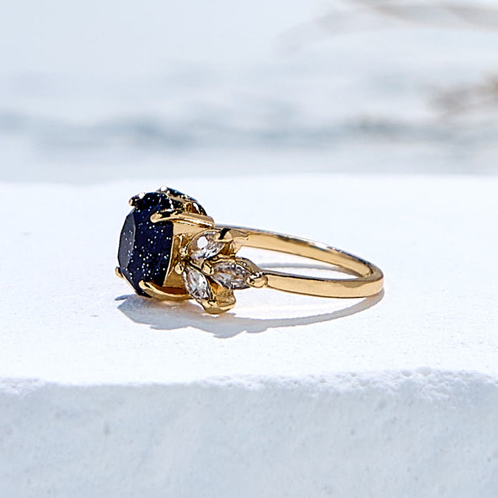Bague en forme de feuille en grès bleu et zircon taille ovale Olivenorma
