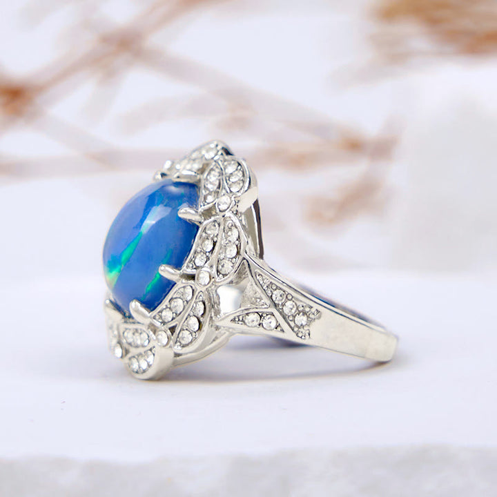 Bague fleur en zircon blanc et opalite de couleur Olivenorma