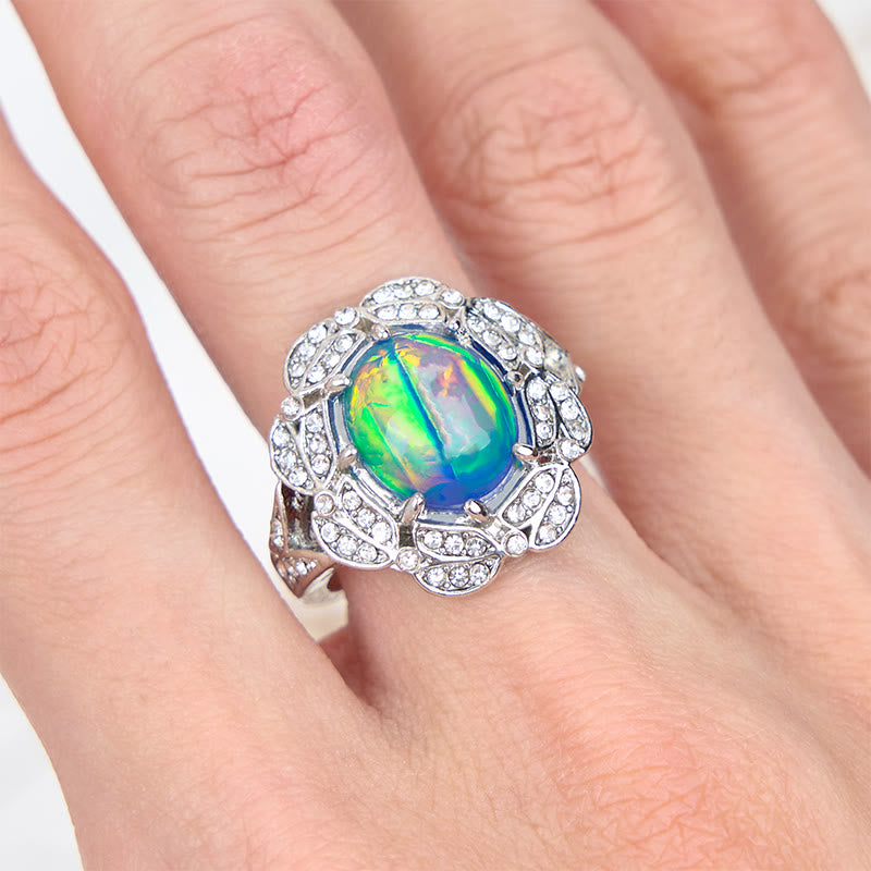 Bague fleur en zircon blanc et opalite de couleur Olivenorma