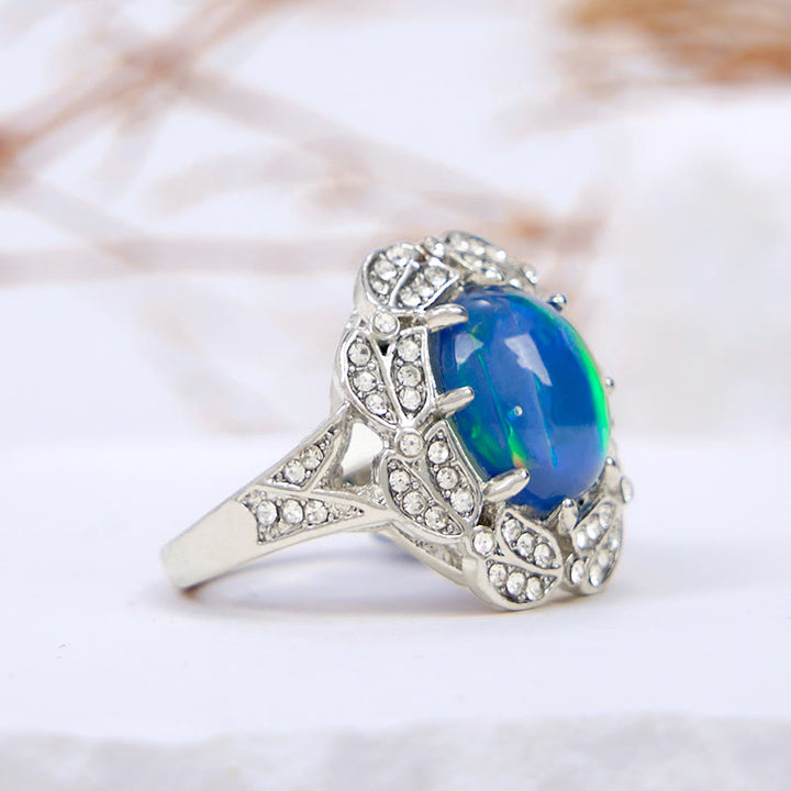 Bague fleur en zircon blanc et opalite de couleur Olivenorma