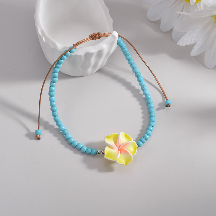 Bracelet de cheville en perles de plumeria turquoise Olivenorma