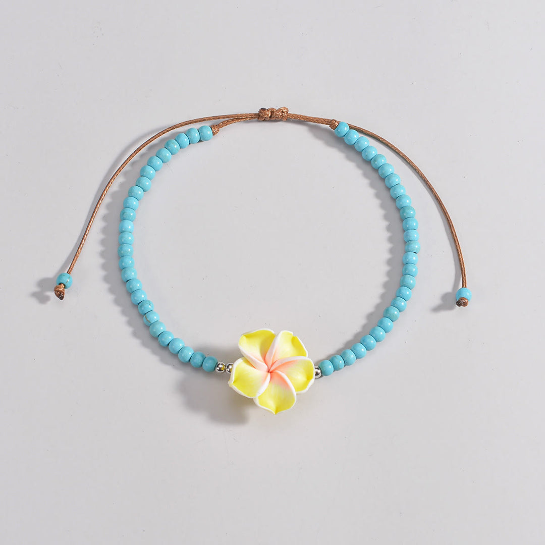 Bracelet de cheville en perles de plumeria turquoise Olivenorma