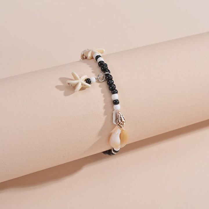 Bracelet de cheville en perles d'escargot et d'étoile de mer en onyx noir turquoise Olivenorma