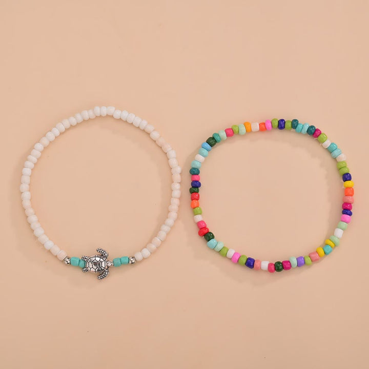 Bracelet de cheville tortue en perles blanches Olivenorma 2 pièces