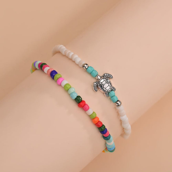 Bracelet de cheville tortue en perles blanches Olivenorma 2 pièces