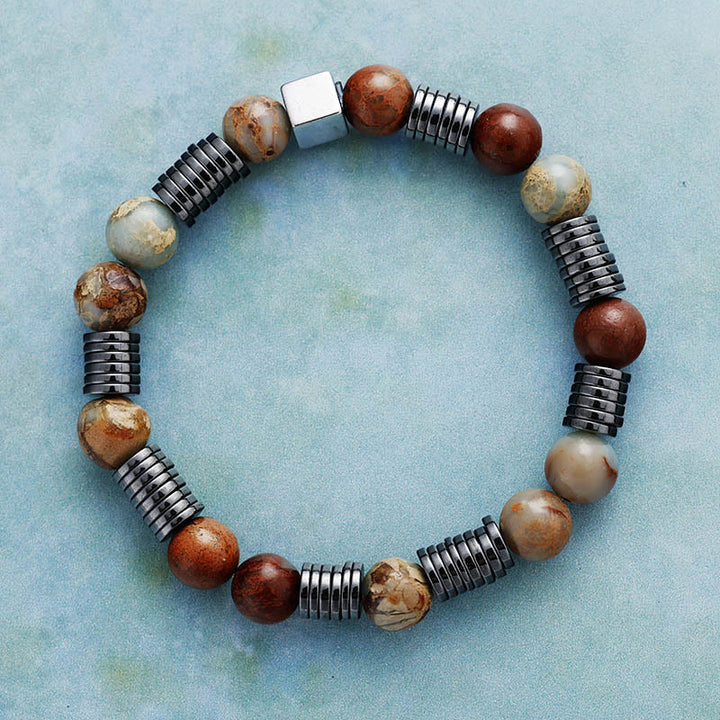 Bracelet Olivenorma en perles d'agalmatolite, d'hématite et d'unakite de 8 mm