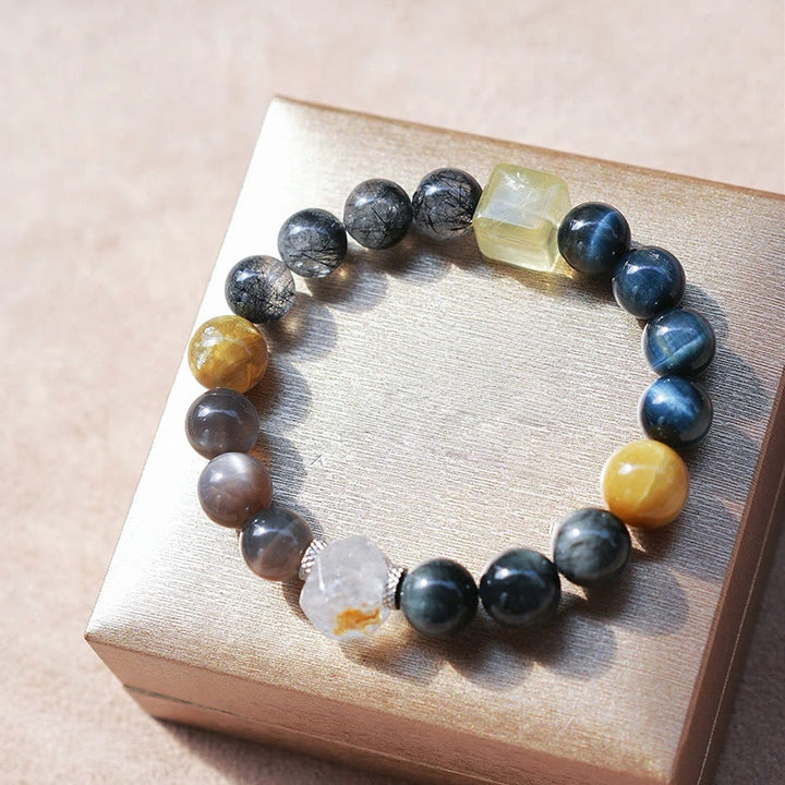 Bracelet en quartz noir rutile et quartz œil de faucon Olivenorma