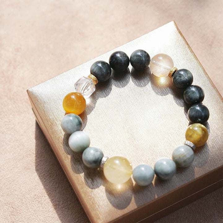 Bracelet en quartz noir rutile et quartz œil de faucon Olivenorma