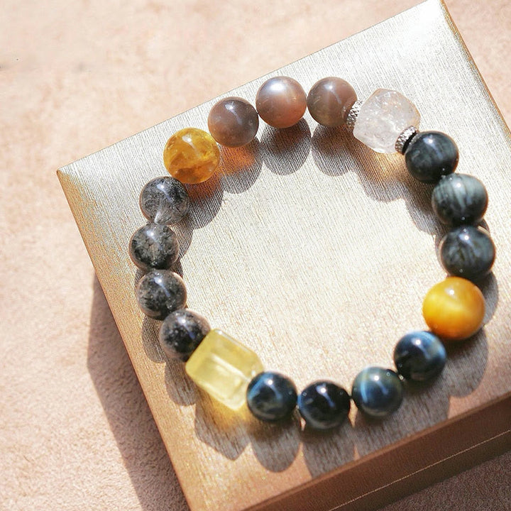 Bracelet en quartz noir rutile et quartz œil de faucon Olivenorma