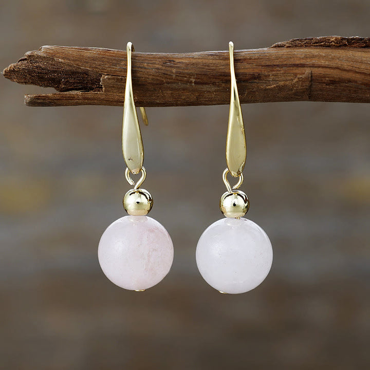 Boucles d'oreilles pendantes en boule de cristal naturel Olivenorma