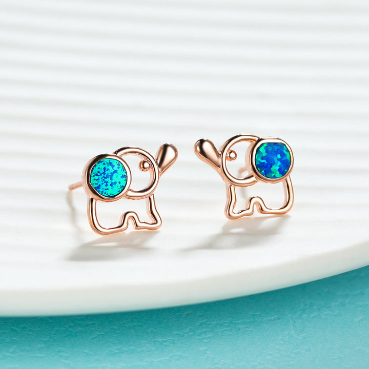 Boucles d'oreilles à tige en forme d'éléphant mignon avec opale bleu et blanc Olivenorma