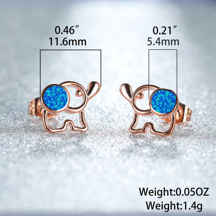 Boucles d'oreilles à tige en forme d'éléphant mignon avec opale bleu et blanc Olivenorma