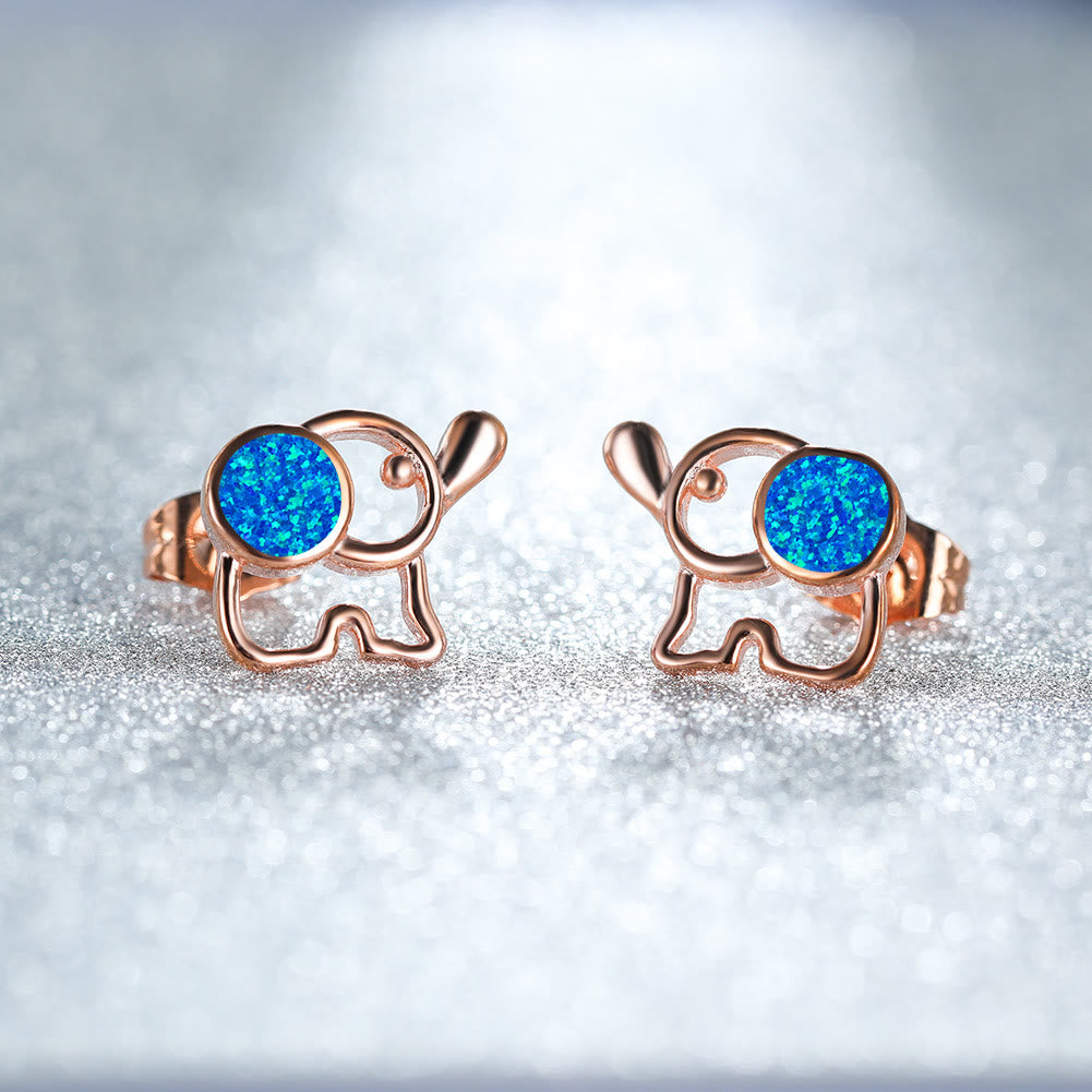 Boucles d'oreilles à tige en forme d'éléphant mignon avec opale bleu et blanc Olivenorma