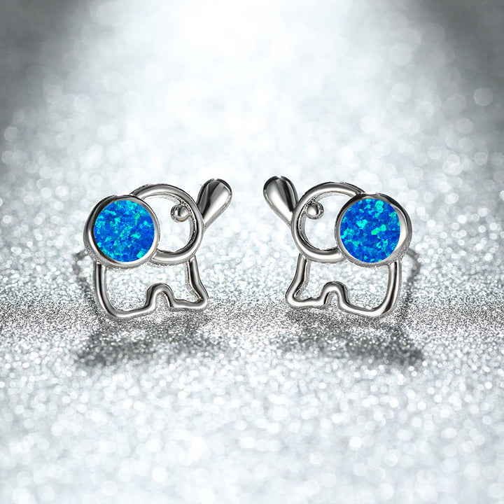 Boucles d'oreilles à tige en forme d'éléphant mignon avec opale bleu et blanc Olivenorma