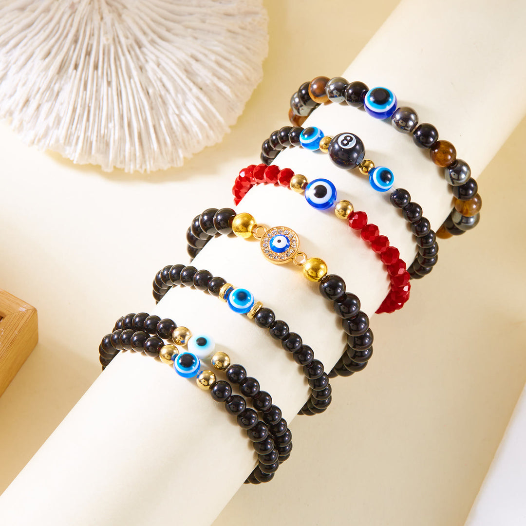 Bracelet en perles d'hématite et d'obsidienne avec œil de tigre et mauvais œil Olivenorma