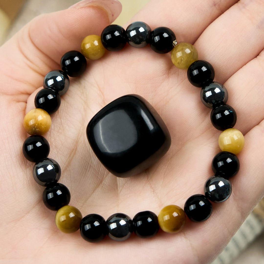Bracelet de perles en hématite et obsidienne œil de tigre jaune Olivenorma