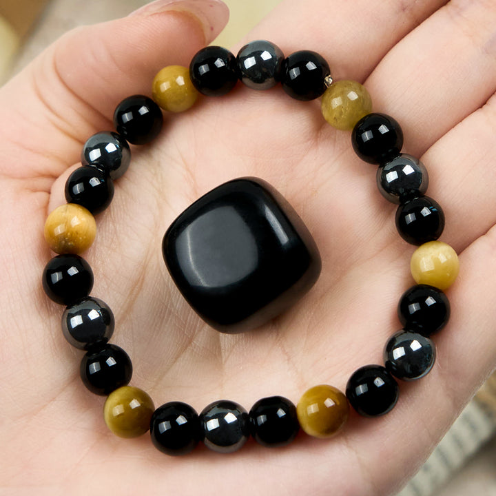Bracelet de perles en hématite et obsidienne œil de tigre jaune Olivenorma