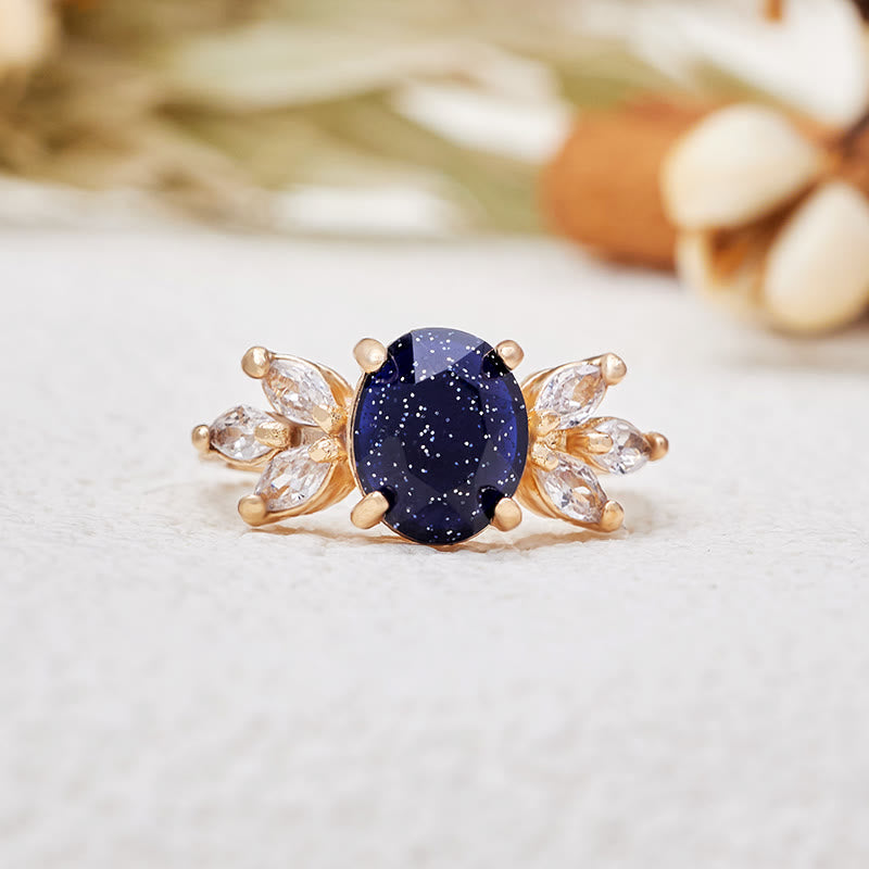 Bague en forme de feuille en grès bleu et zircon taille ovale Olivenorma