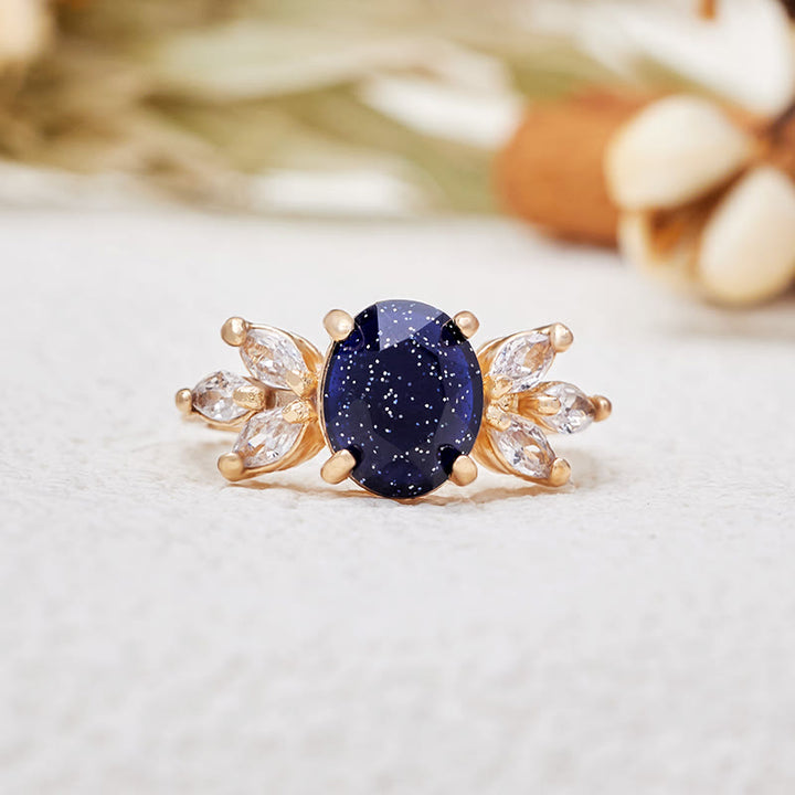 Bague en forme de feuille en grès bleu et zircon taille ovale Olivenorma