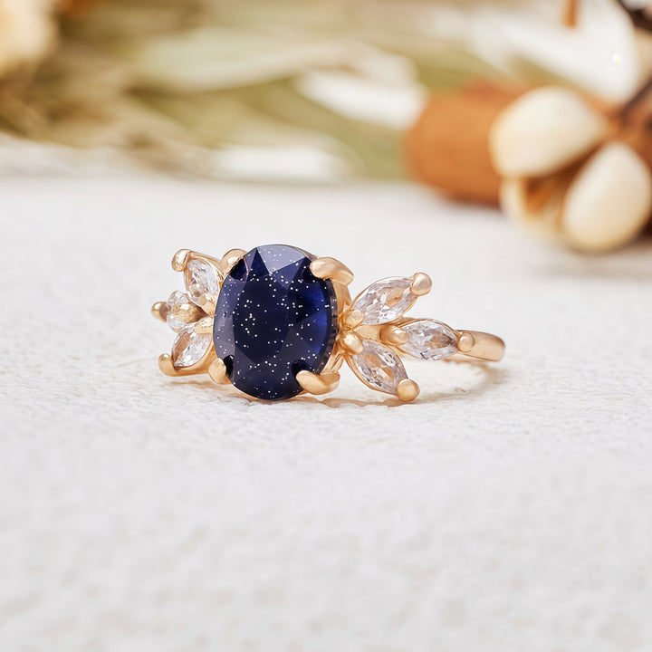 Bague en forme de feuille en grès bleu et zircon taille ovale Olivenorma