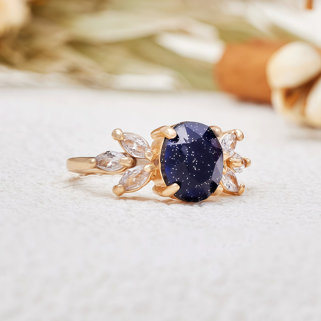 Bague en forme de feuille en grès bleu et zircon taille ovale Olivenorma