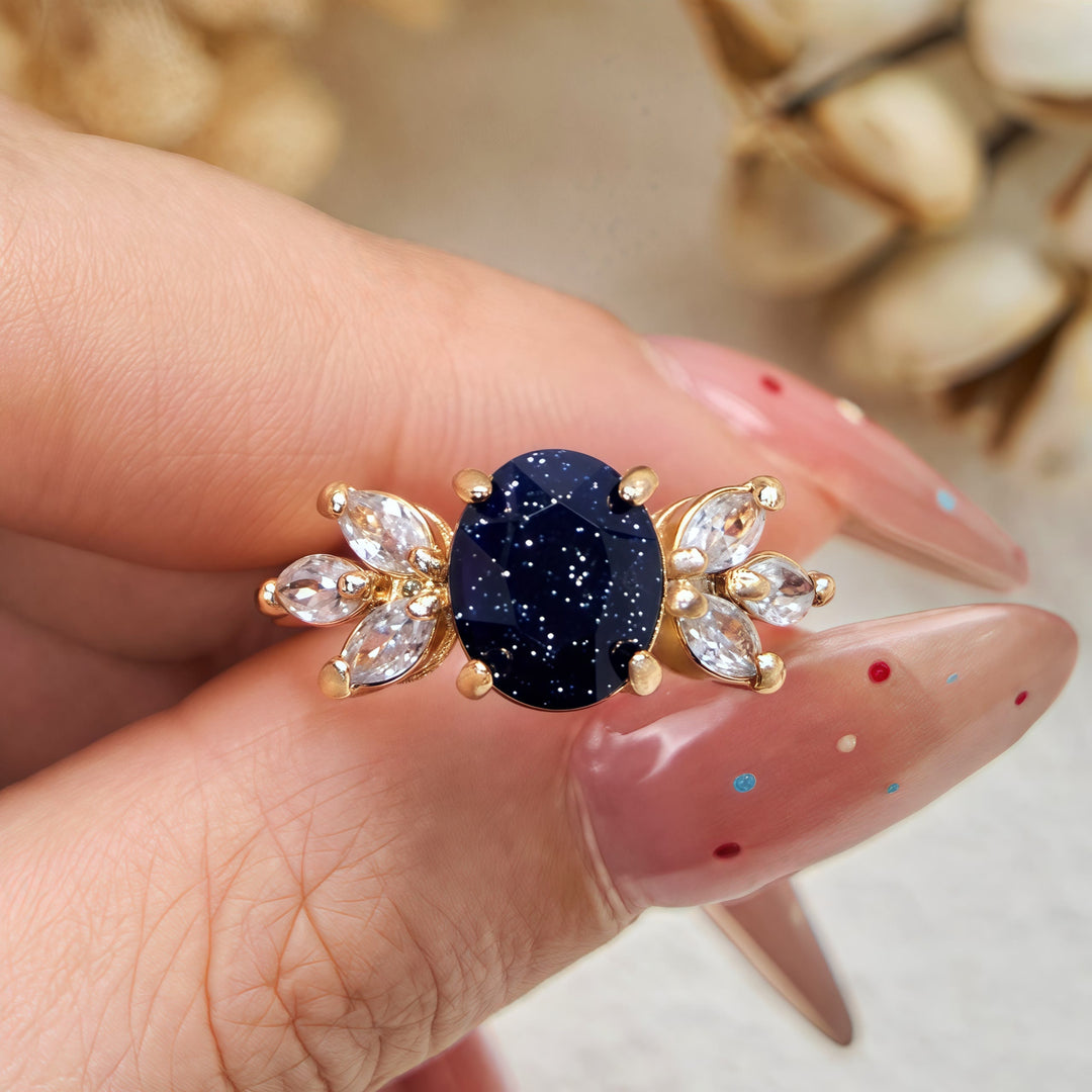 Bague en forme de feuille en grès bleu et zircon taille ovale Olivenorma