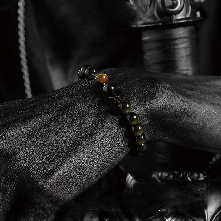Bracelet en perles d'obsidienne Dark Moon Harsh Sun d' Olivenorma
