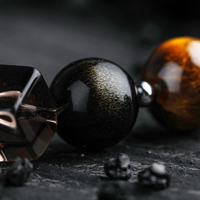 Bracelet en perles d'obsidienne Dark Moon Harsh Sun d' Olivenorma