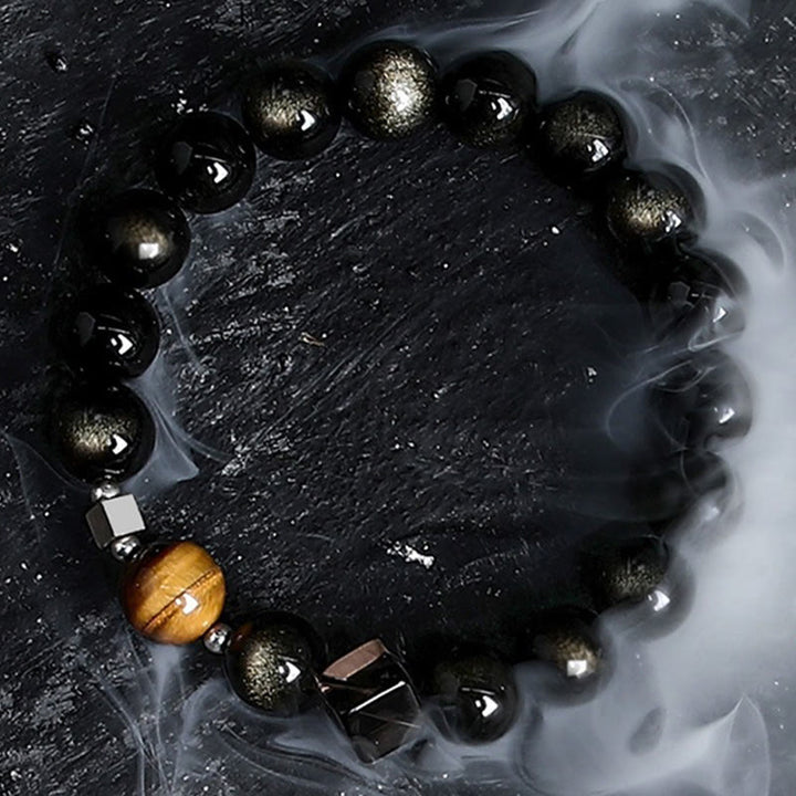 Bracelet en perles d'obsidienne Dark Moon Harsh Sun d' Olivenorma