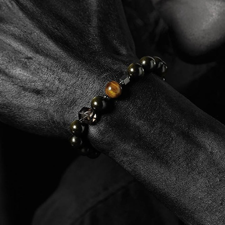 Bracelet en perles d'obsidienne Dark Moon Harsh Sun d' Olivenorma