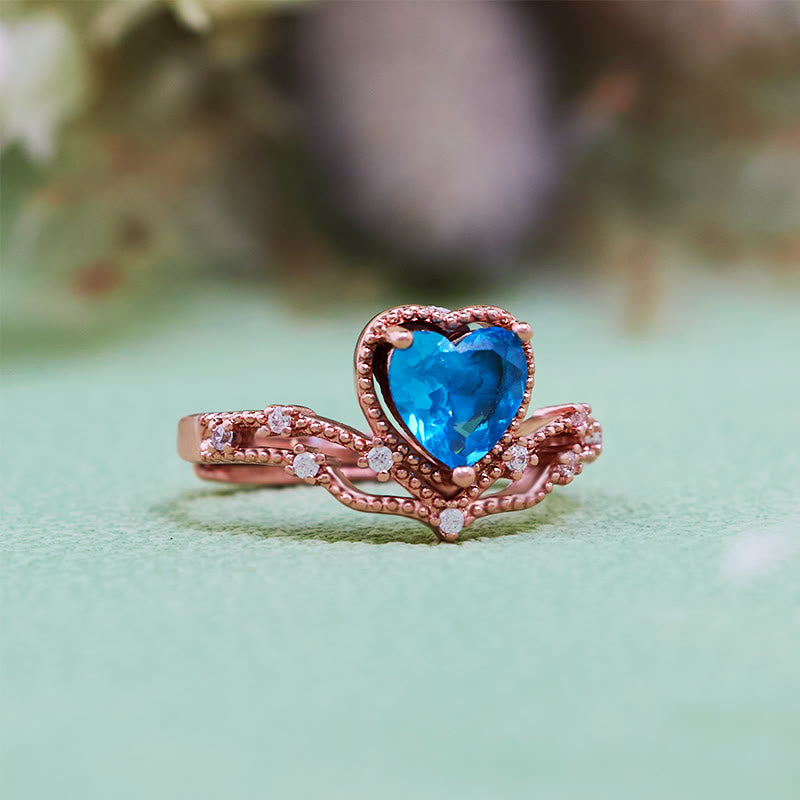 Bague en forme de couronne avec topaze bleue en forme de cœur Olivenorma