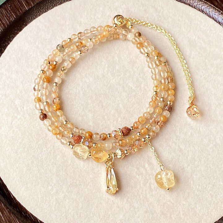 Collier et bracelet en perles de quartz rutile et citrine Olivenorma