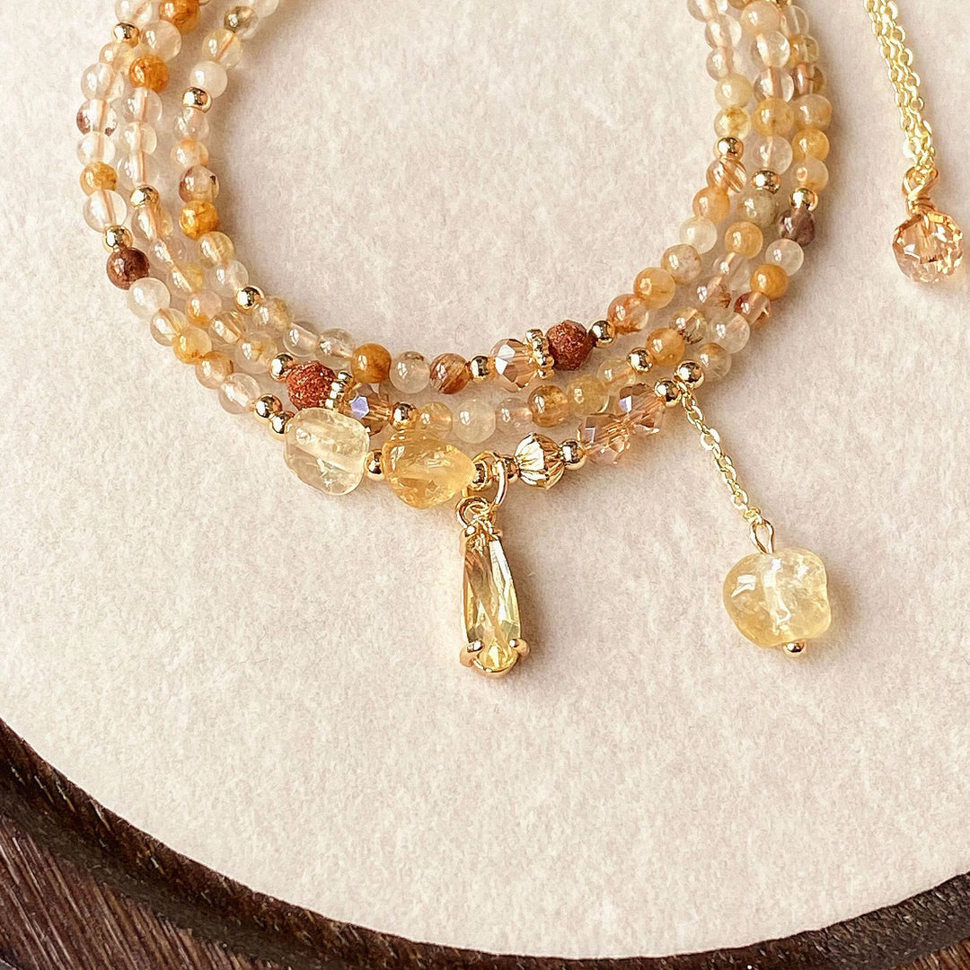 Collier et bracelet en perles de quartz rutile et citrine Olivenorma