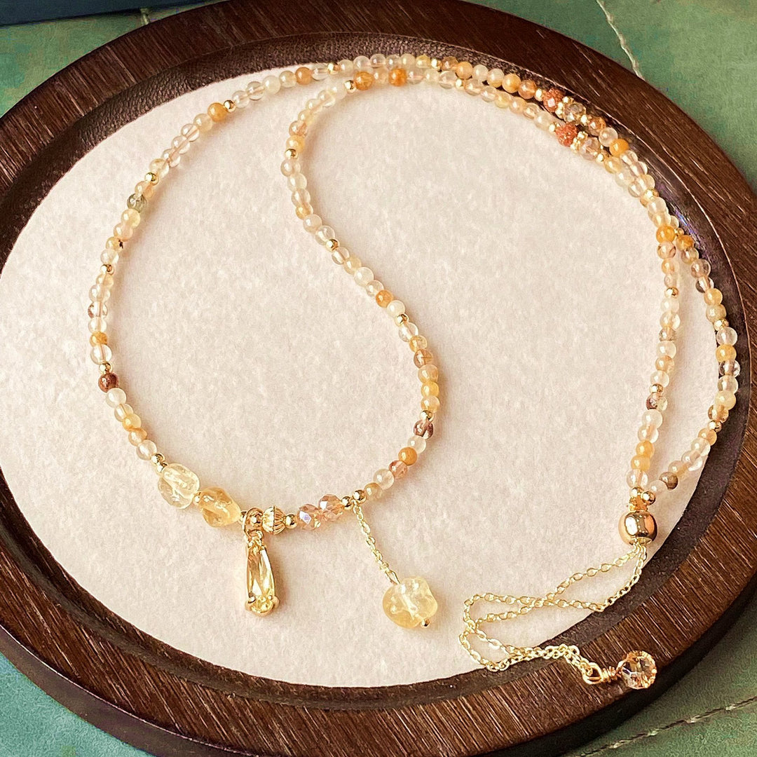 Collier et bracelet en perles de quartz rutile et citrine Olivenorma