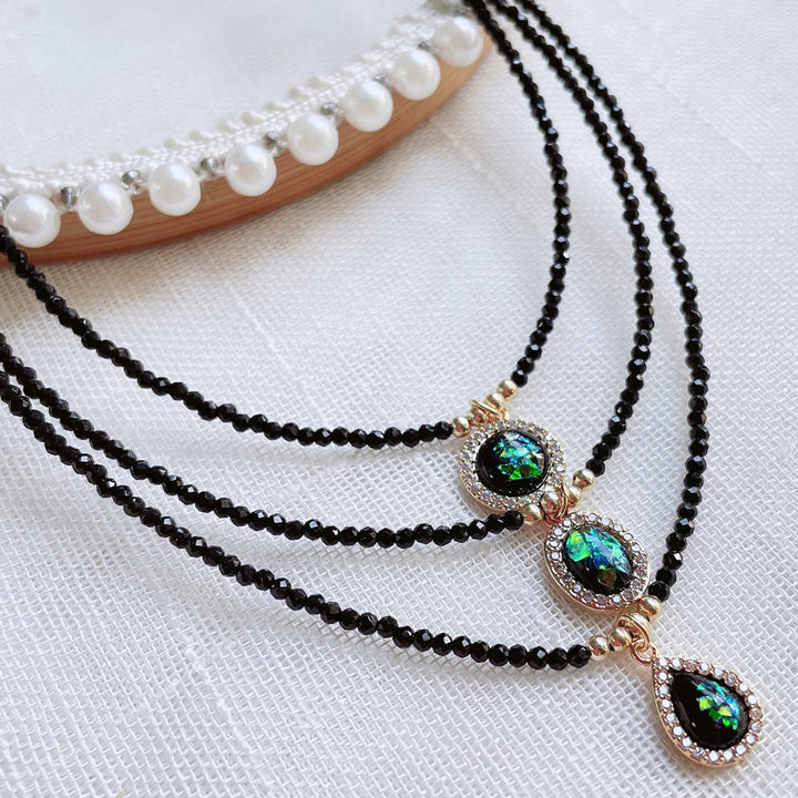 Collier avec pendentif en opale verte et perles d'obsidienne Olivenorma