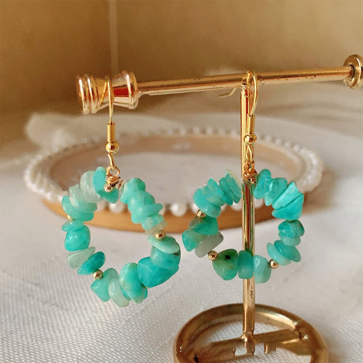 Boucles d'oreilles créoles en cristal naturel concassé Olivenorma