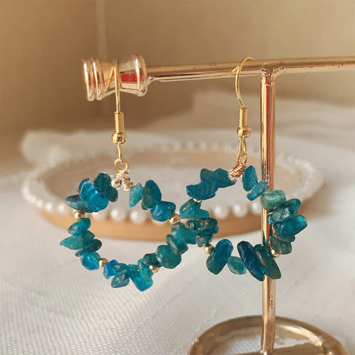 Boucles d'oreilles créoles en cristal naturel concassé Olivenorma